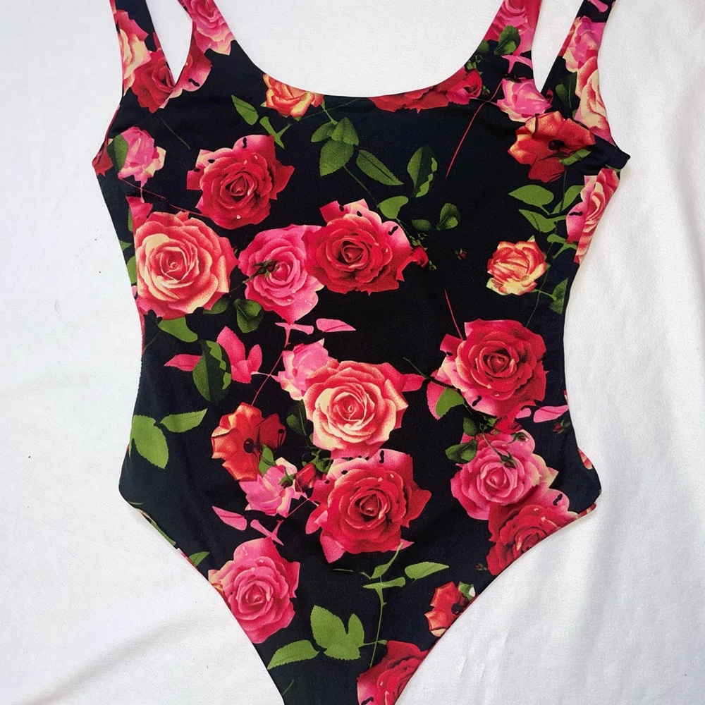 Floral body suit size medium